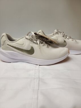 Nike Neutral/Tan Running Shoes with Metallic Swoosh